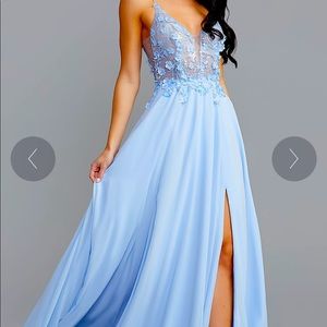 Prom Girl dress. Never worn with tags still on in size 4. Dress is beautiful!